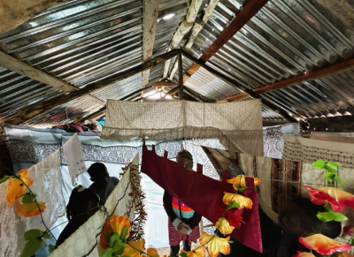Tim's point of view inside a Haitian couple's home