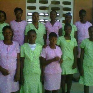The women in their hand sewed outfits.