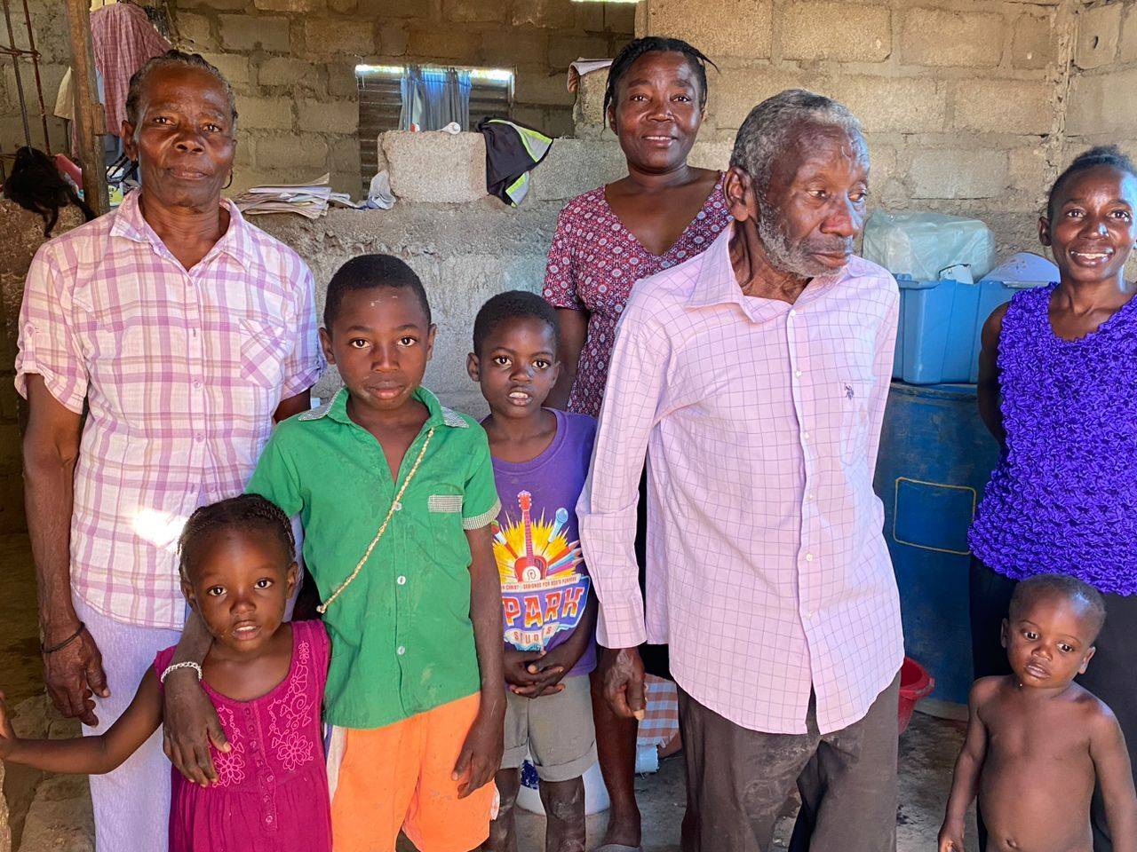 Akseus sick man family gift of food stretch out hand Feb 2024