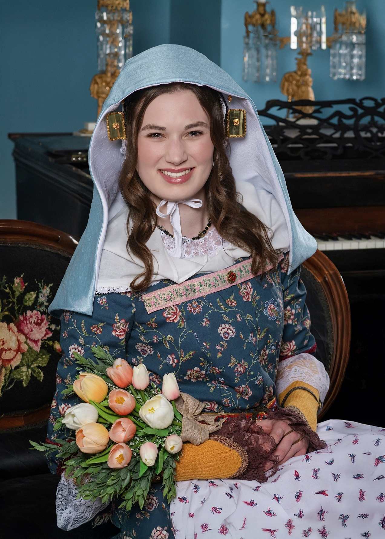 Abbie smiling as a senior member of Pella's Tulip Court